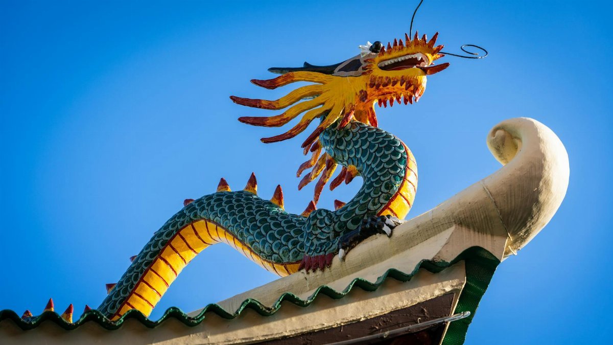 Colorful dragon sculpture on a temple rooftop in Cebu City, Philippines.