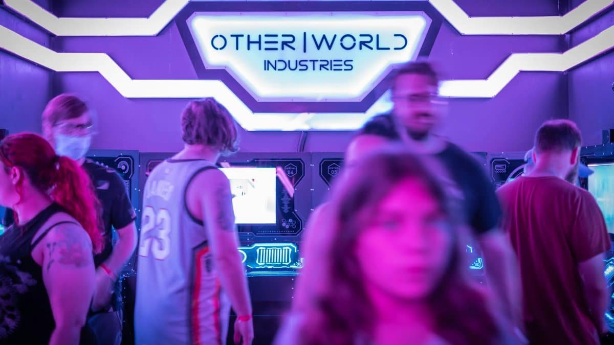 People enjoying games at a neon-lit arcade, capturing the energetic and futuristic vibe.