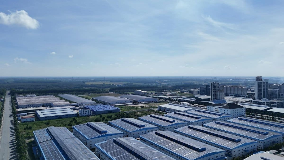 Aerial shot of a modern industrial park with warehouses in Bình Dương, Vietnam.