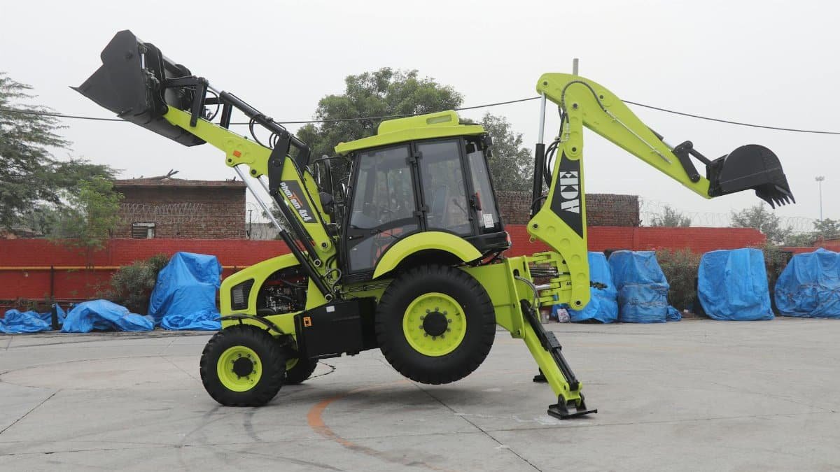 ACE Phantom backhoe loader displayed outdoors in Faridabad, India.