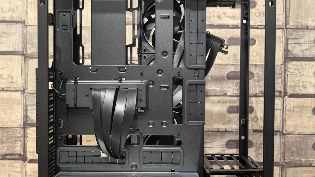 Detailed view of a computer case interior, perfect for tech builds and custom setups.