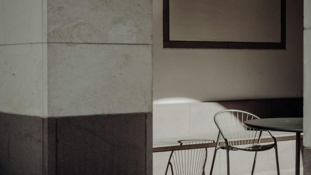 A stylish minimalist seating area showcasing modern architecture and design.