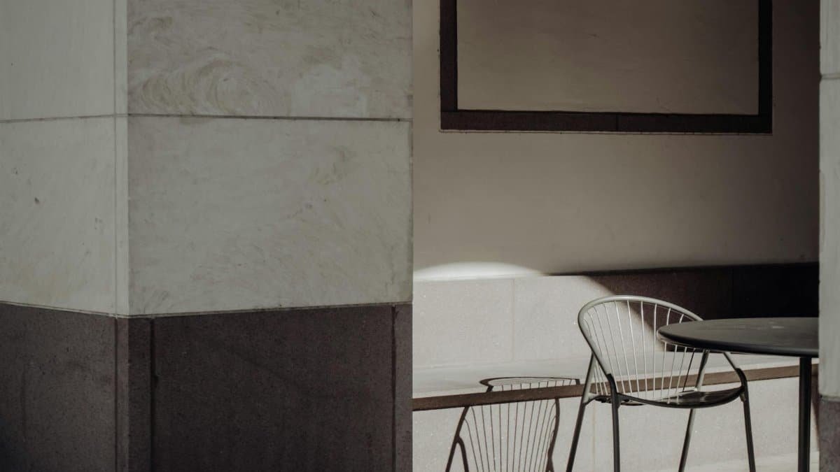 A stylish minimalist seating area showcasing modern architecture and design.