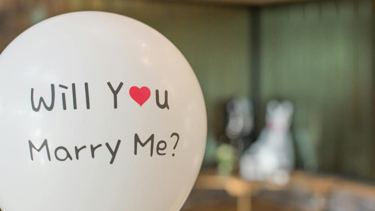 A romantic balloon with 'Will You Marry Me?' for a heartfelt marriage proposal.
