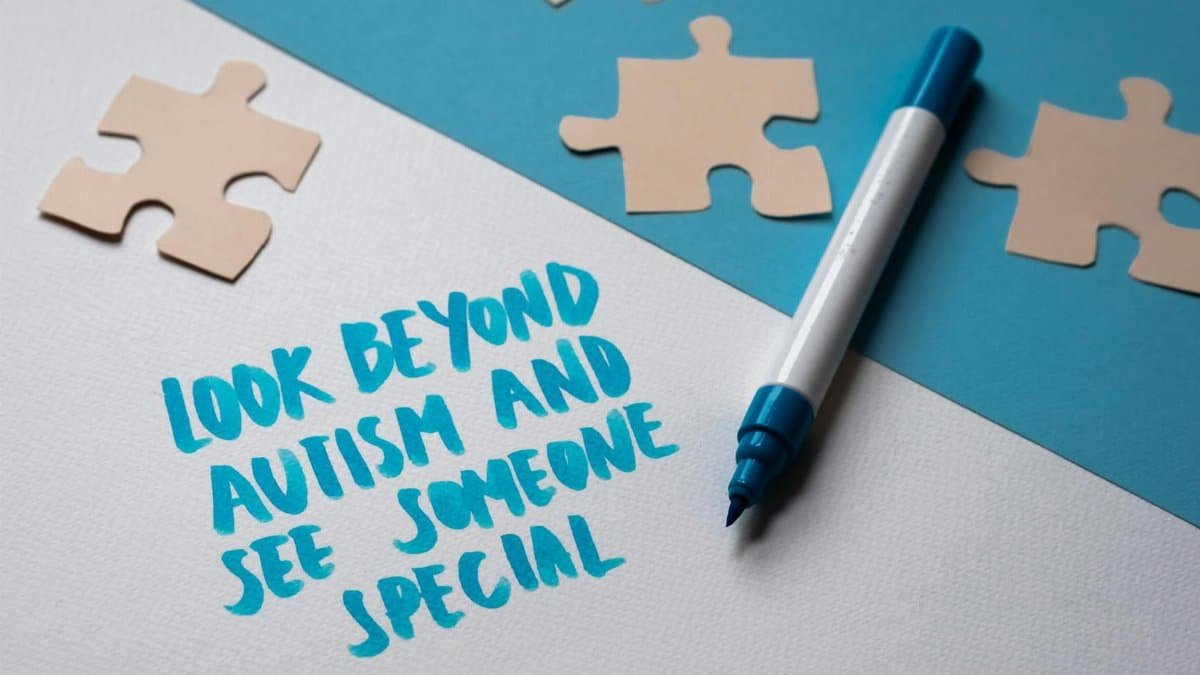 Inspirational autism awareness message with puzzle pieces and handwritten text.
