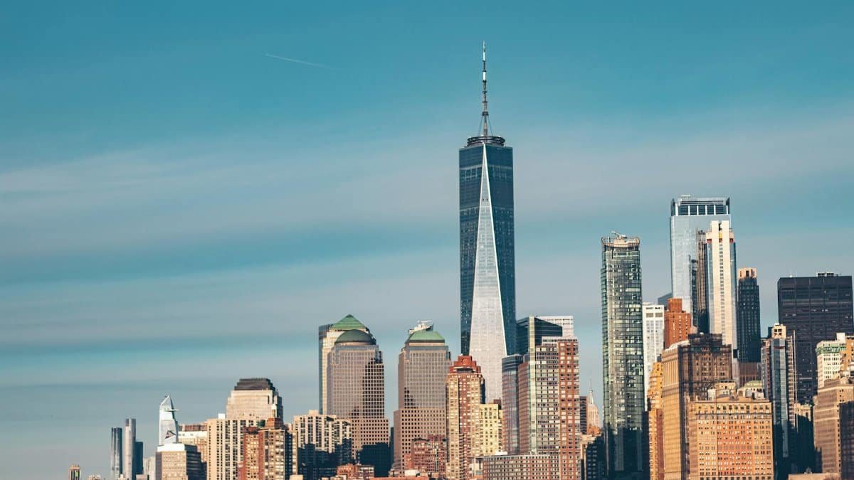 Stunning view of New York City skyline with One World Trade Center and modern architecture.