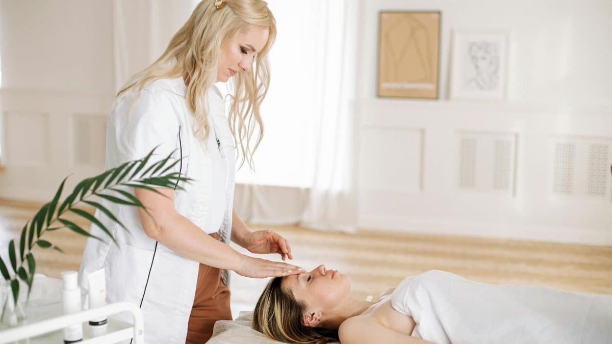 A relaxing face massage session in a serene spa environment, promoting wellness and relaxation.