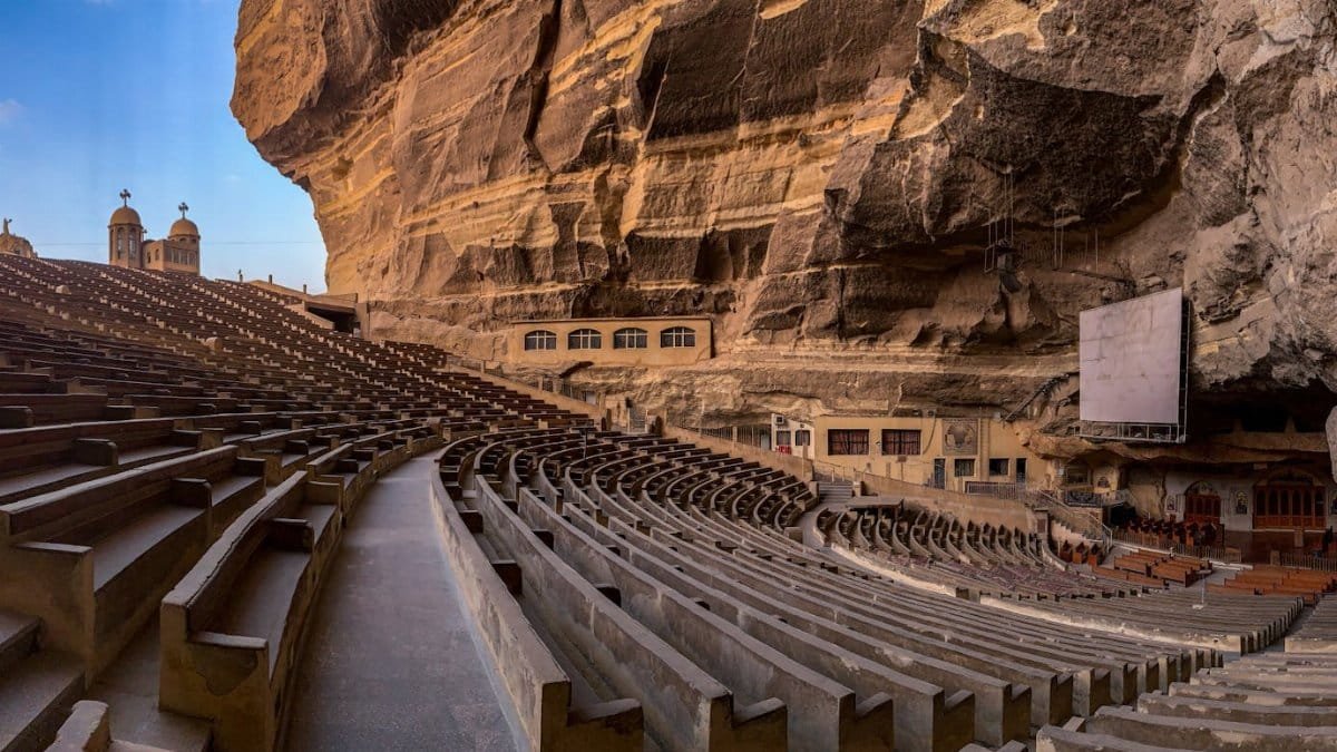 Panoramic view of St. Simon the Tanner Monastery's cave church seating area in Cairo, Egypt.