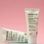 Two Sesderma Retises 0.50 skincare tubes displayed on a pink background, highlighting anti-aging cream.