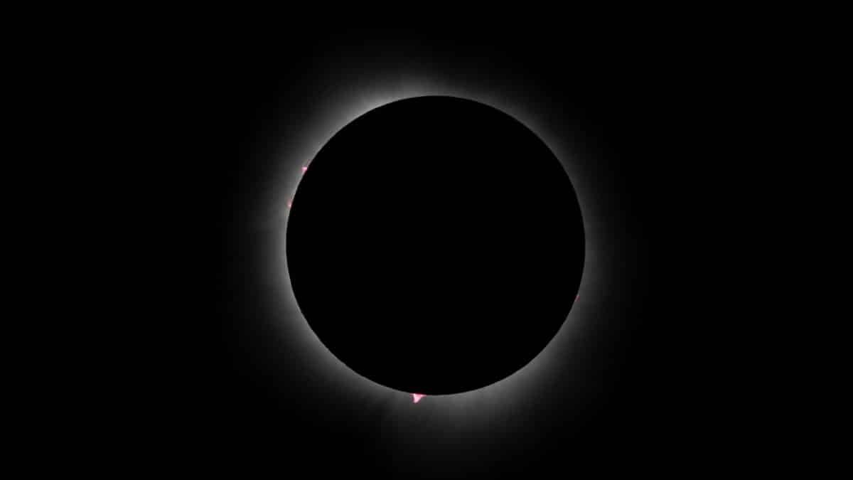 Capture of an annular solar eclipse with glowing corona, showcasing celestial beauty in a dark sky.