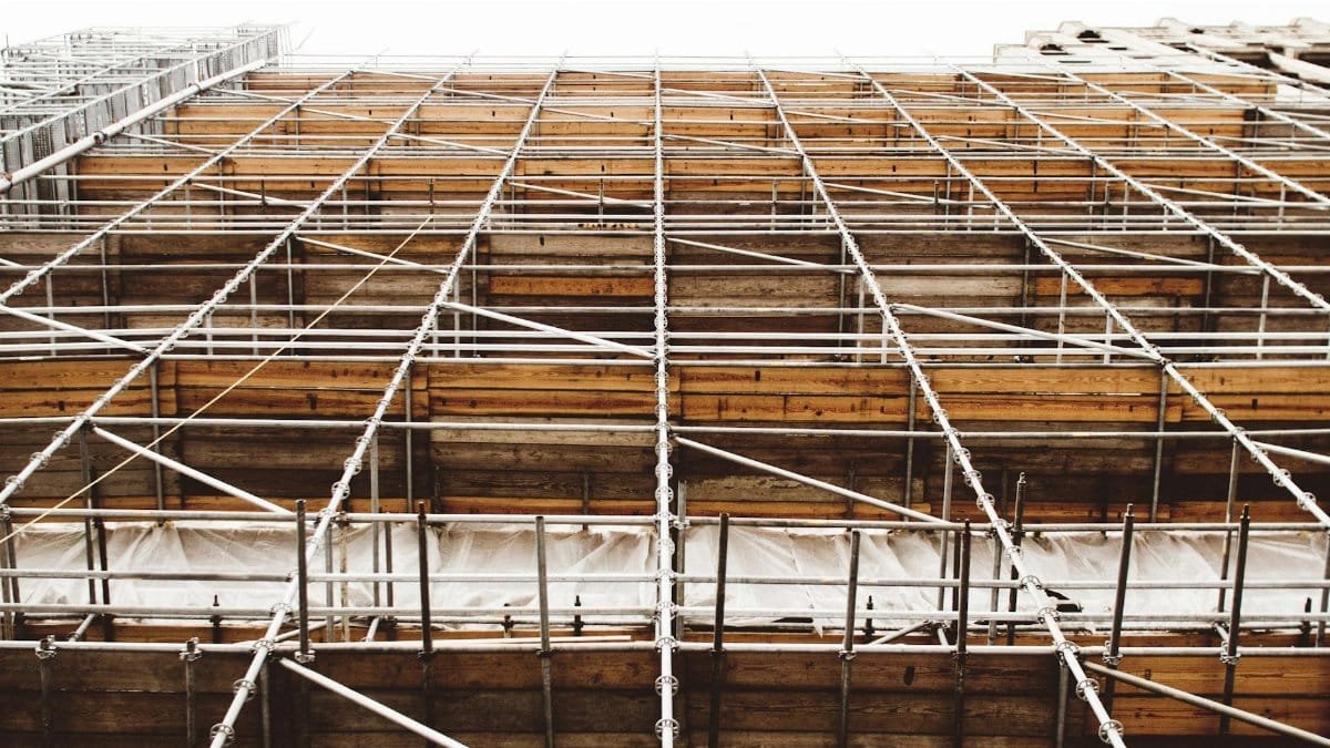 A detailed view of scaffolding at a construction site shows structure and pattern.