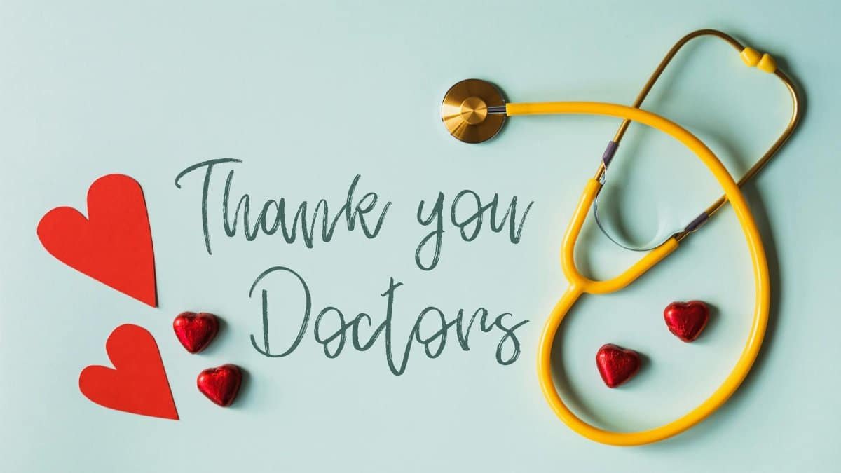 A stethoscope with hearts and 'Thank You Doctors' inscription on a blue background.