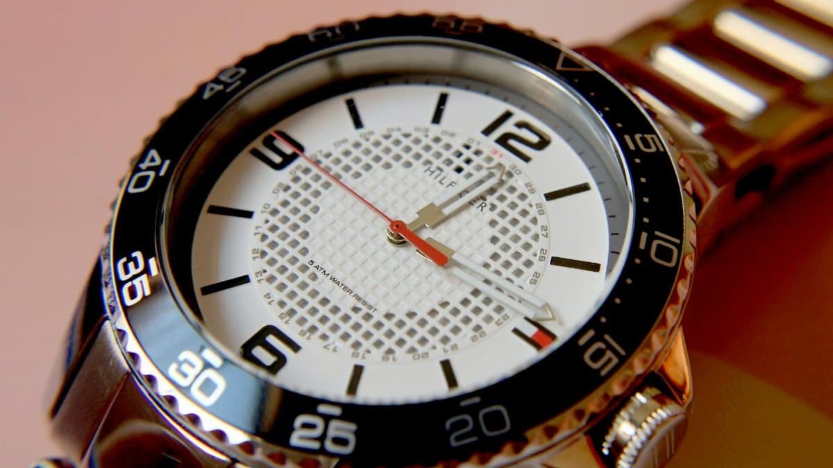 Close-up of an elegant wristwatch showcasing its precise design and timekeeping elements.