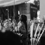 Atmospheric black and white photo capturing a Palm Sunday church gathering in Baguio City.