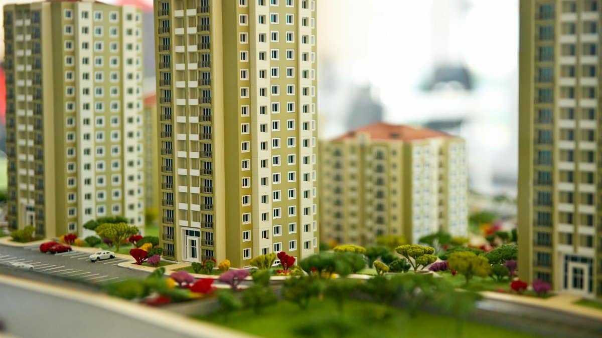 Close-up image of a modern residential building model, showcasing urban architecture.