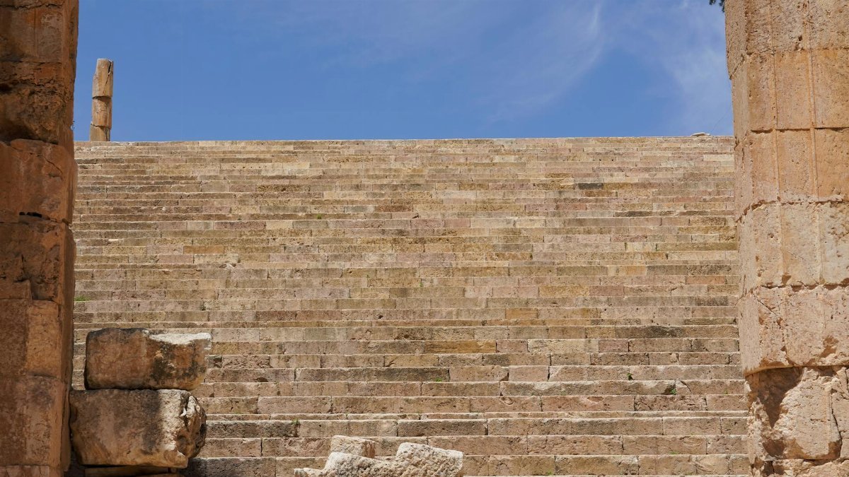 Explore the ancient stone steps of Jerash, a significant archaeological site in Jordan.