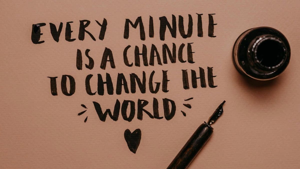 A motivational quote handwritten with a fountain pen, inspiring change and positivity.