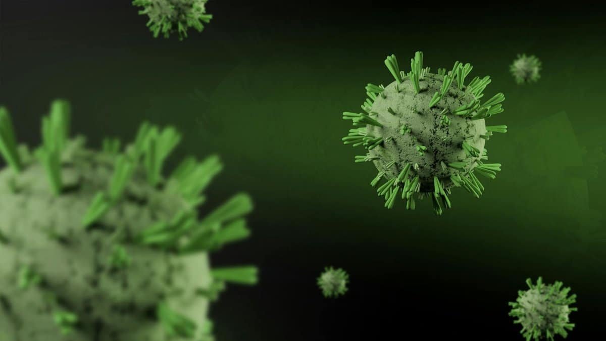 Close-up 3D render of virus particles floating on a dark green background, showcasing detailed virus structure.