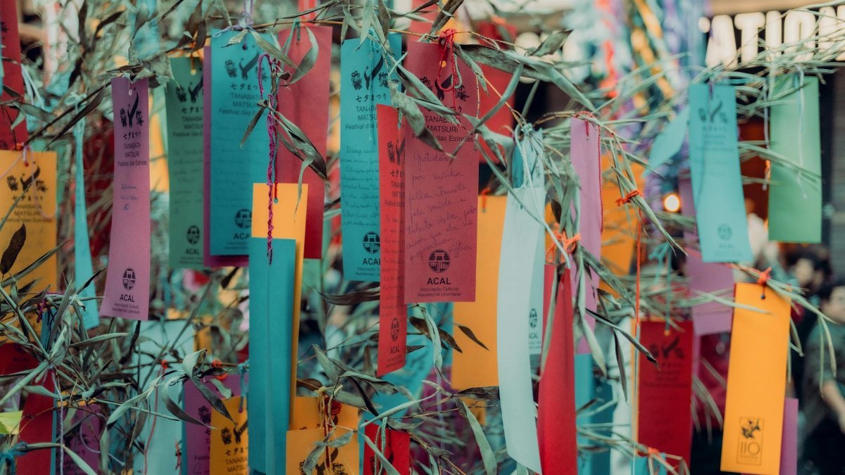 Vibrant wishing tags hanging on bamboo during Tanabata, symbolizing hopes and dreams.