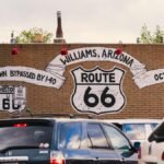 Vibrant mural celebrating Route 66 on a street in Williams, Arizona.