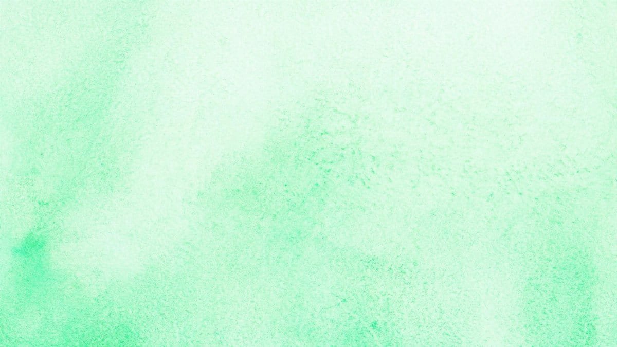 A soft light green watercolor texture background ideal for design use.