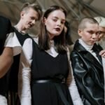 A diverse group of Gen Z individuals showcasing unique style and fashion indoors.