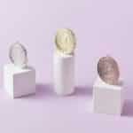 Three medals on podium blocks symbolizing first, second, and third place awards.