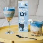 Vibrant chia pudding with oat milk served in a cozy indoor setting.