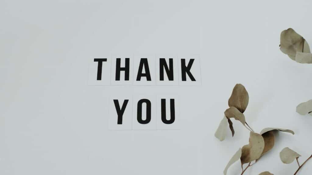 A minimalist thank you note with eucalyptus leaves, perfect for expressing gratitude.