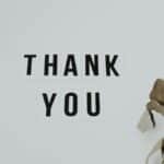 A minimalist thank you note with eucalyptus leaves, perfect for expressing gratitude.