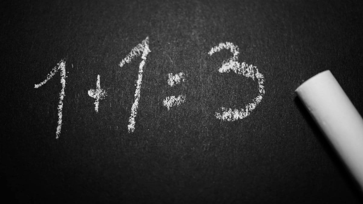 Chalkboard with a humorous incorrect math equation, ideal for educational settings.