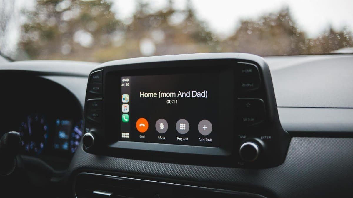 Screen of modern multimedia system in car with hand free call to home