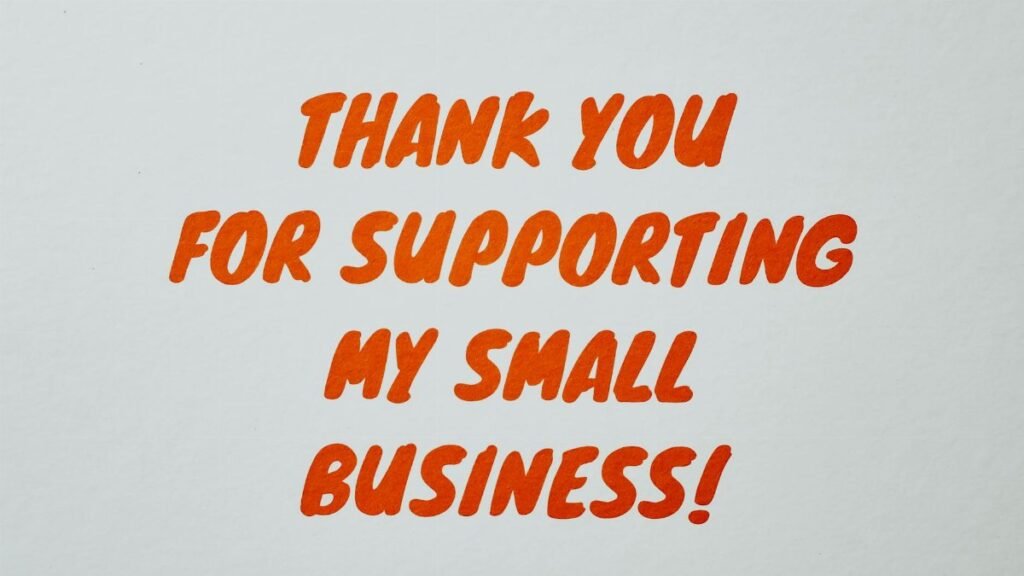 Simple 'Thank You' message in orange text on white background celebrating small business support.