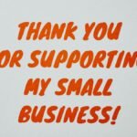 Simple 'Thank You' message in orange text on white background celebrating small business support.