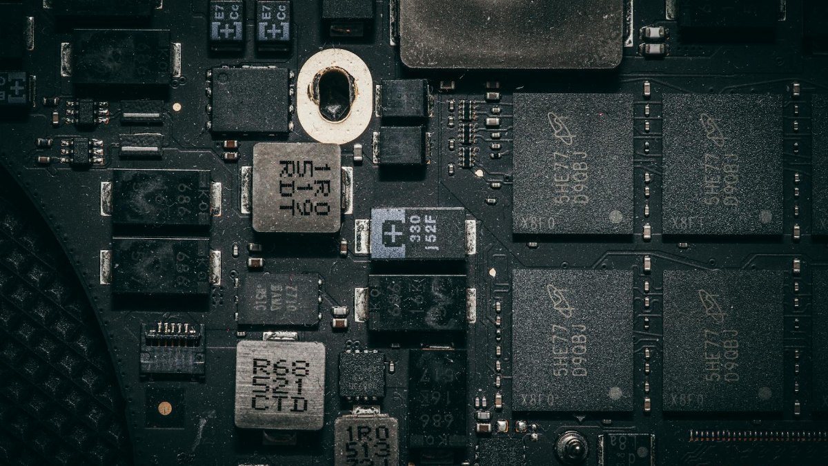 Detailed close-up of a computer circuit board highlighting electronic components and intricate design.