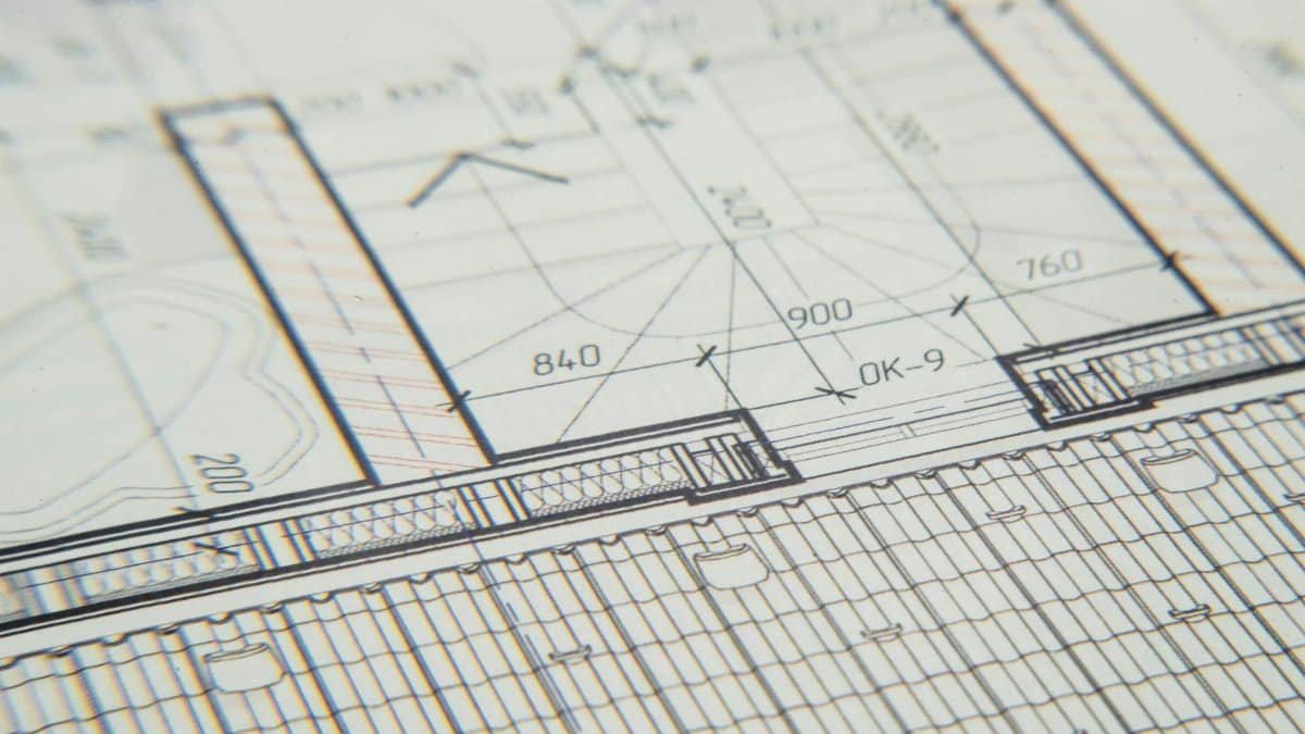 Close-up of an architectural blueprint showcasing intricate design details for a building layout.