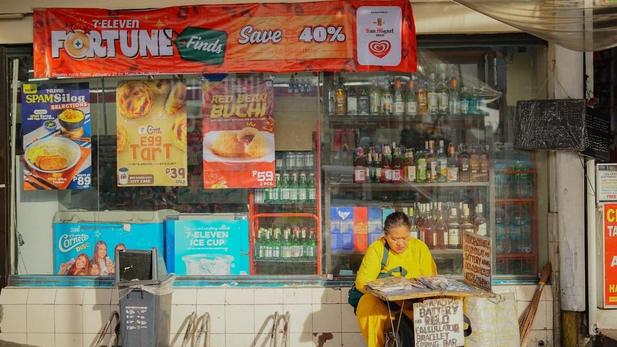 A vibrant street scene outside a convenience store in Pasig, Metro Manila, showcasing everyday life.