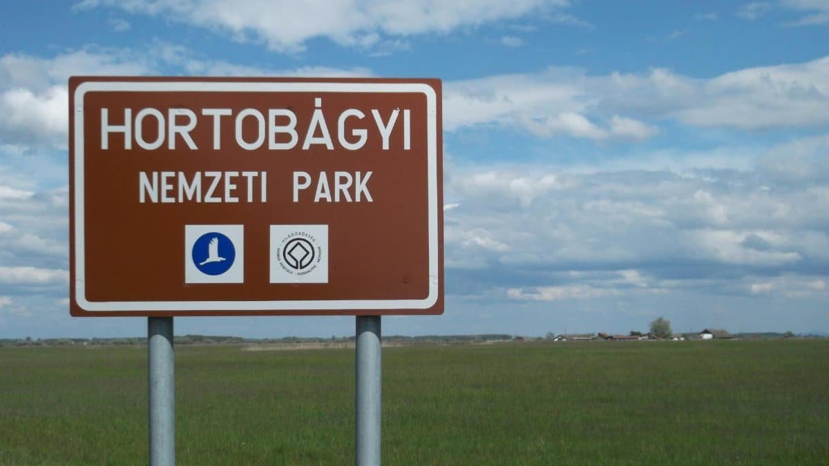 Sign at Hortobágy National Park in Hungary, highlighting travel in summer.