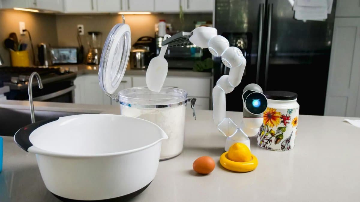 AI-powered robot assisting in a kitchen, highlighting smart technology in everyday cooking.