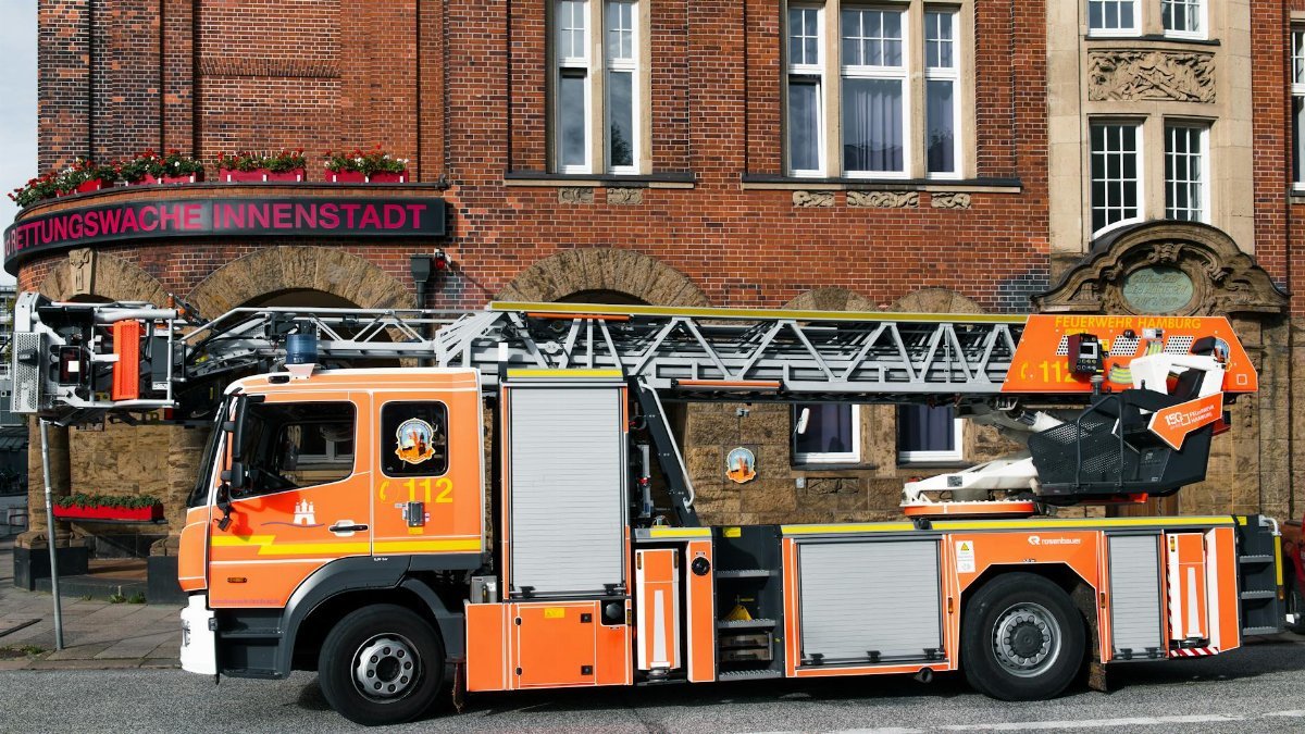 Fire truck parked outside the Rettungswache Innenstadt in Hamburg.