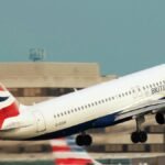 A British Airways aircraft takes off, showcasing aviation and travel themes.