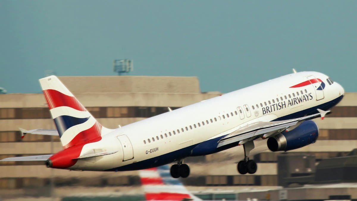 A British Airways aircraft takes off, showcasing aviation and travel themes.