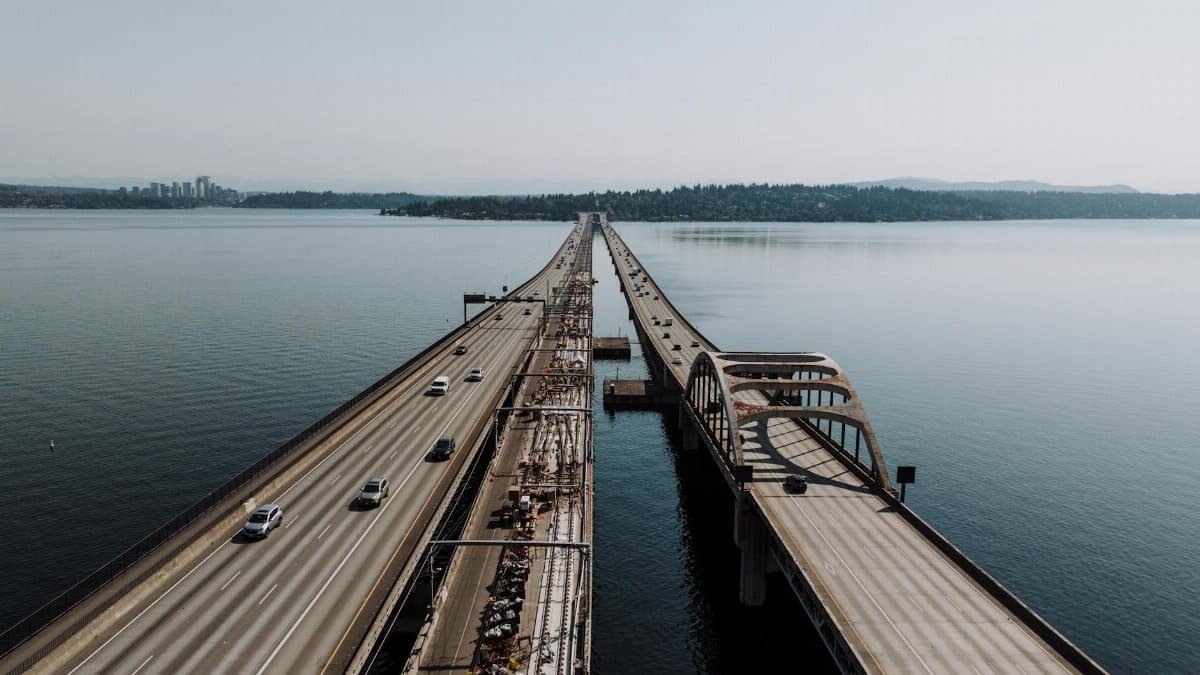 Aerial shot of a floating bridge linking Seattle across Lake Washington.