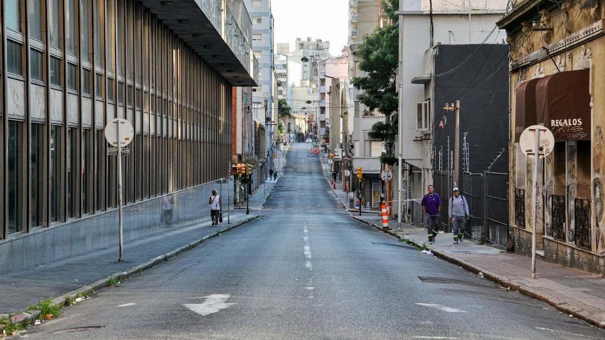 A tranquil urban street in Montevideo, Uruguay, showcasing architecture and daily life.