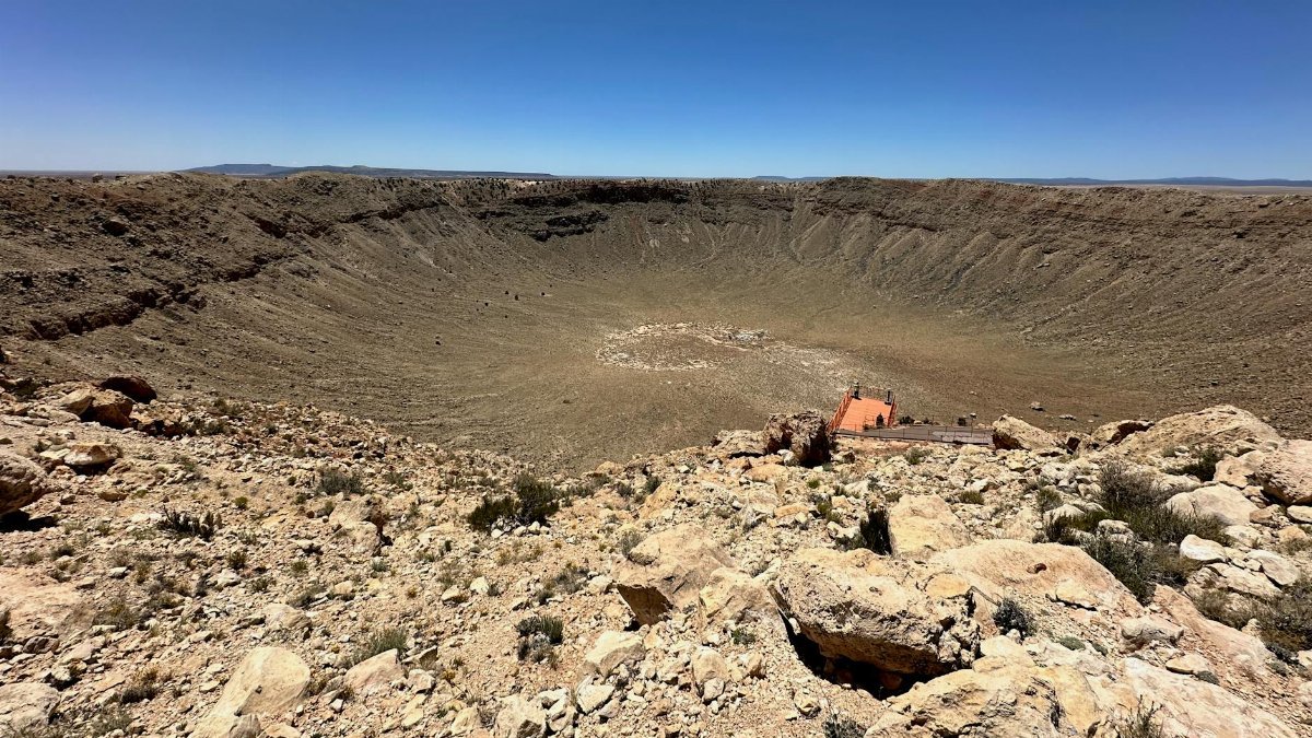 A stunning view of Meteor Crater in Winslow, Arizona on a clear sunny day.