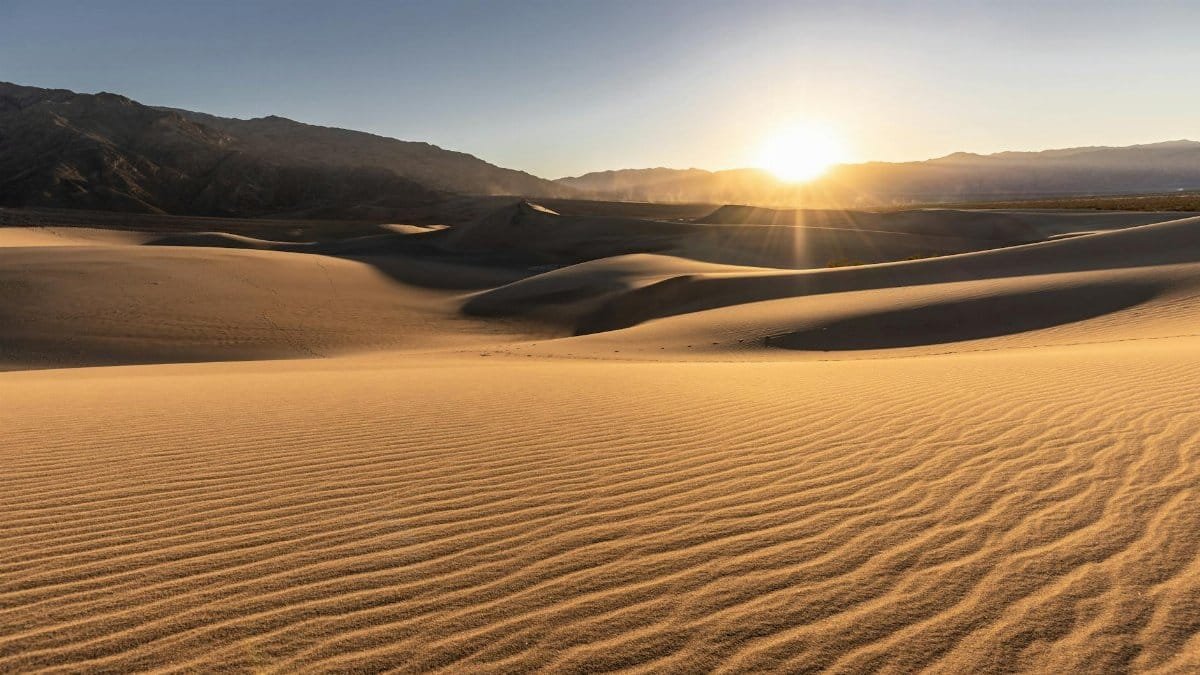 Breathtaking sunrise over Mesquite Flat Sand Dunes in California's Death Valley National Park.