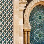 Detailed view of traditional Moorish tilework showcasing intricate patterns and vibrant colors in historic architecture.