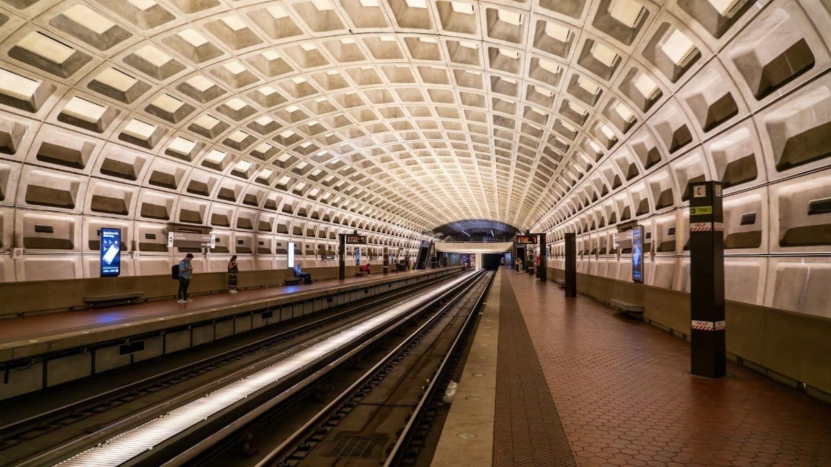 Elegant underground metro station in Washington D.C. showcasing modern design with geometric arches.