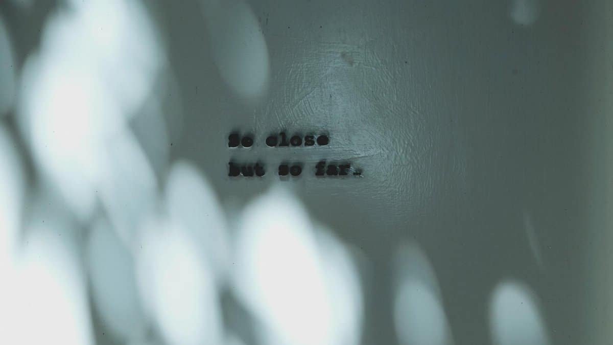 A minimalistic image featuring shadows and a thought-provoking quote.