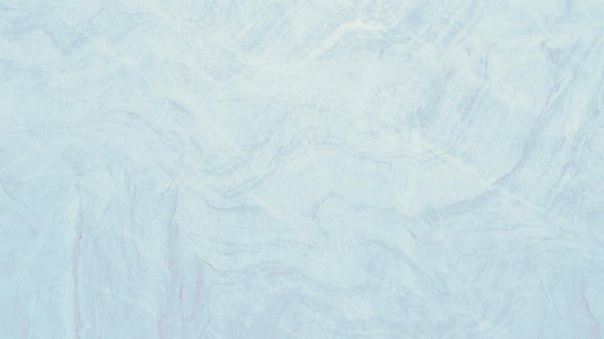 Light pastel blue marble texture showcasing smooth surface with soft wave patterns, ideal for design use.